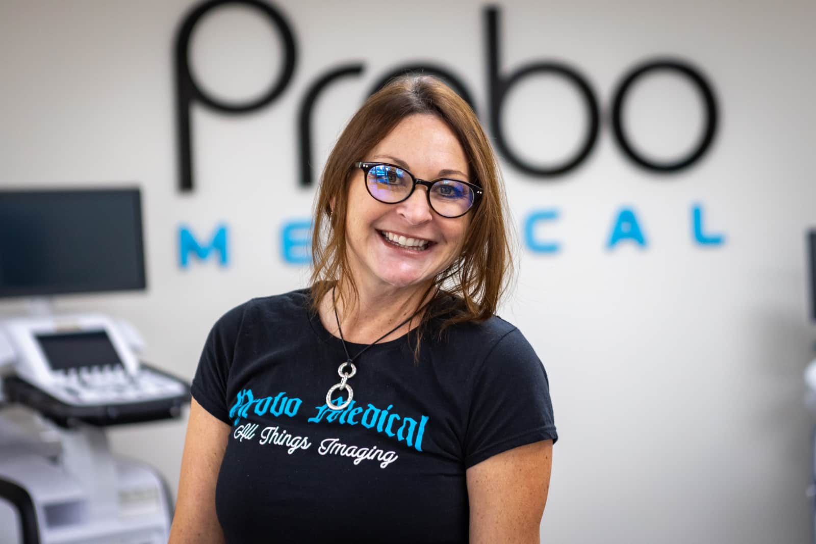 Probo Medical Employee April Smiling in office